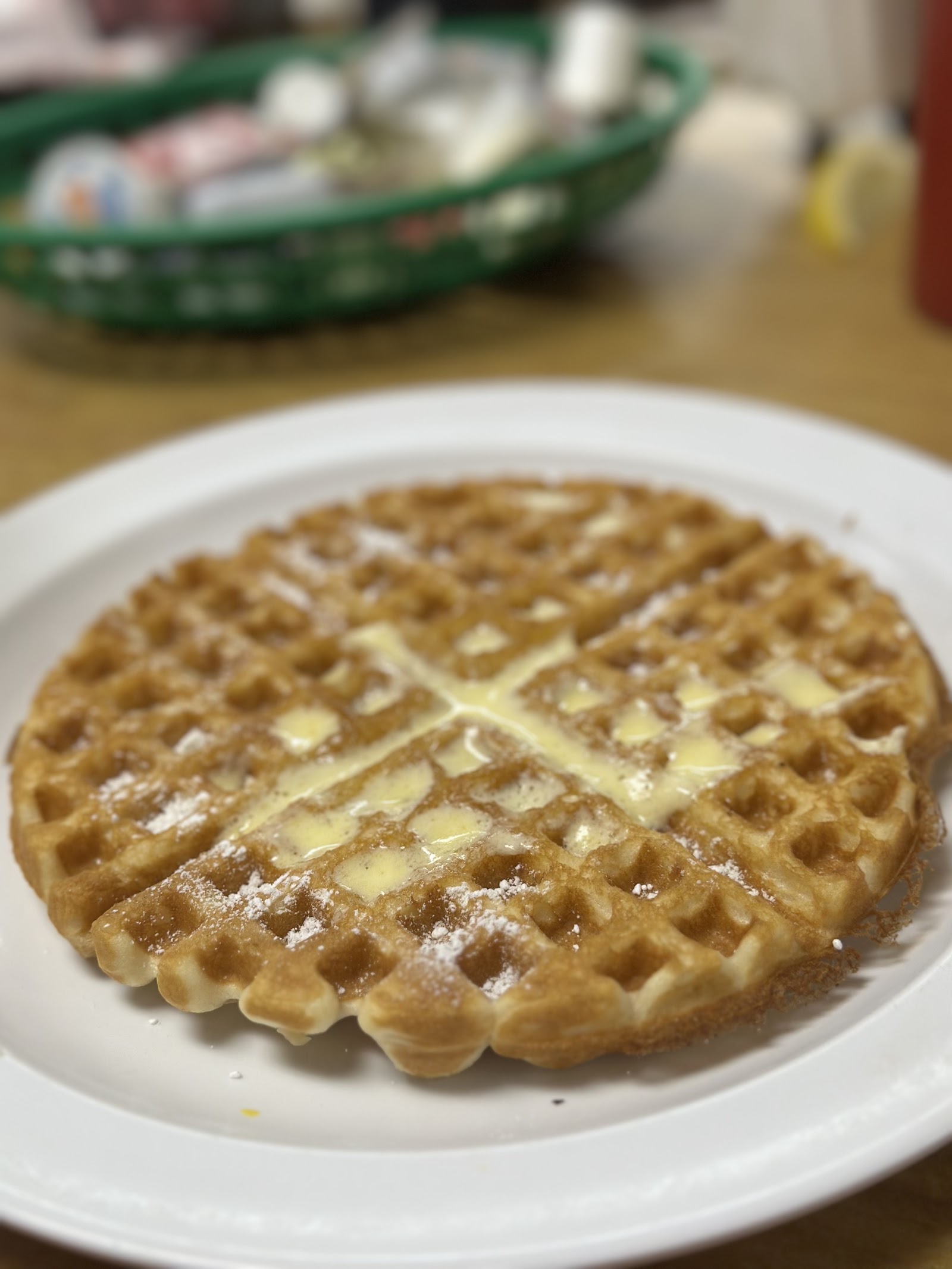 Belgian waffle with butter and powdered sugar at Jack's Cafe